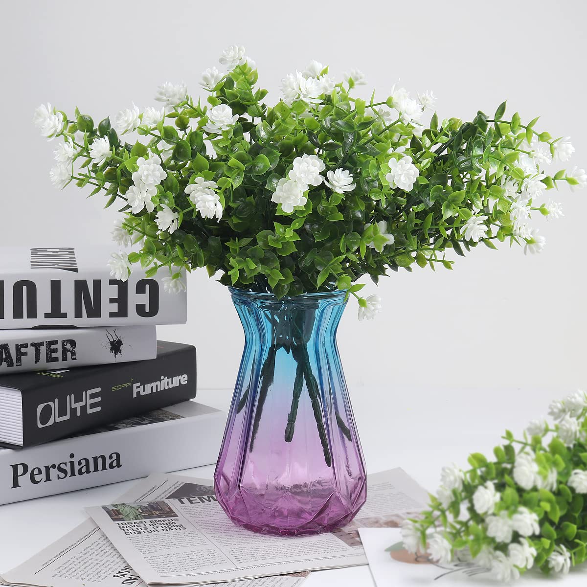 RECUTMS white wreath style greenery adds instant charm to entrances and tables.