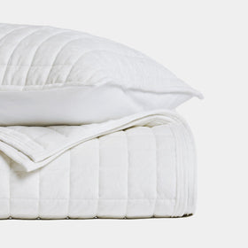 RECYCO all-season velvet quilt aids comfortable temperature control with breathable fabric.