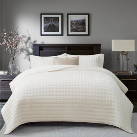 RECYCO cream white bedroom decor ensemble on a neatly made bed