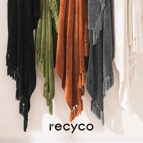 RECYCO throw blanket rust color complements living room decor.