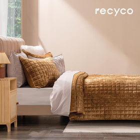 RECYCO Caramel Gold velvet quilt with channel box stitch provides a chic focal point.
