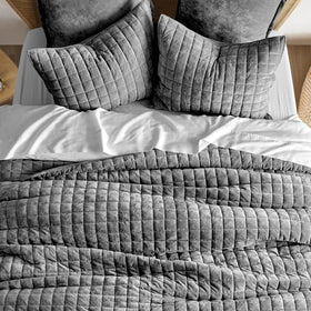 RECYCO velvet fabric detail shows brushed finish and breathable warmth for all seasons.