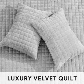RECYCO channel stitch detail highlights structured, luxurious quilt pattern.