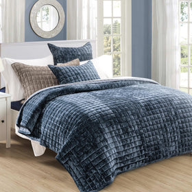 Close-up of RECYCO channel stitch on velvet quilt highlighting durable construction.