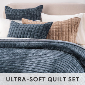 Two RECYCO shams paired with the quilt for a coordinated luxury look.