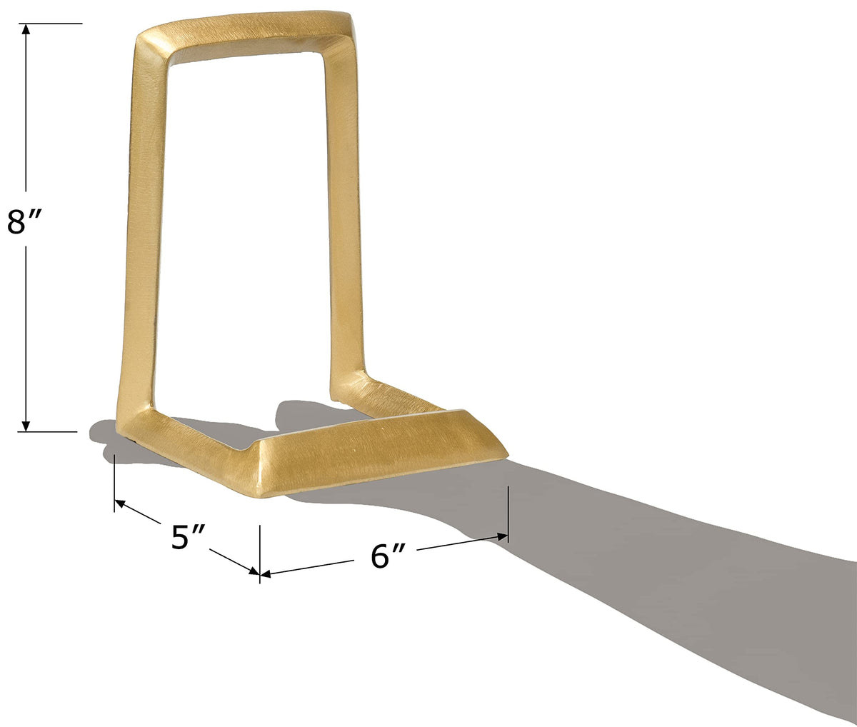 Red Co. tabletop display easel in distressed gold enhances shelves.
