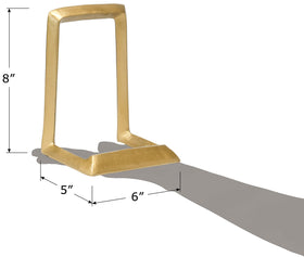 Red Co. tabletop display easel in distressed gold enhances shelves.
