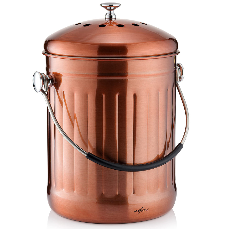 Red Factor premium compost bin with lid sits stylishly on the kitchen counter for easy scraps.