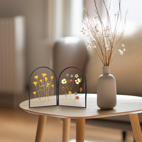 REDHUGO brass and glass frame for durable long-lasting decor.