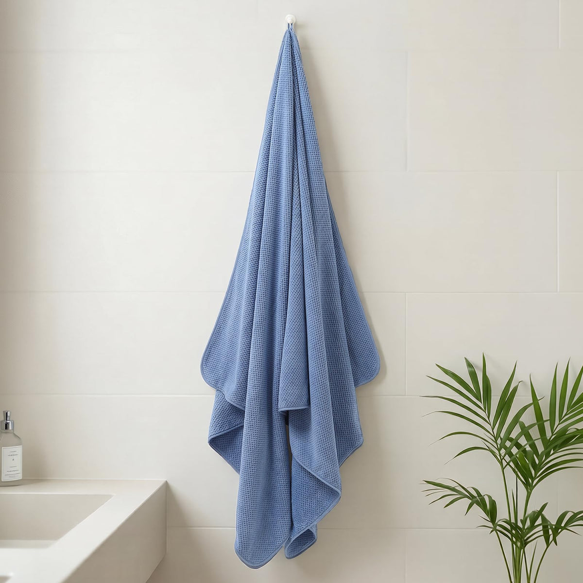 REDKISS jumbo bath sheet blue machine-wash friendly for easy care.
