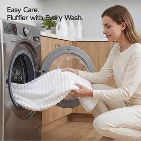 RedKiss low-heat tumble-drying icon indicating lint reduction