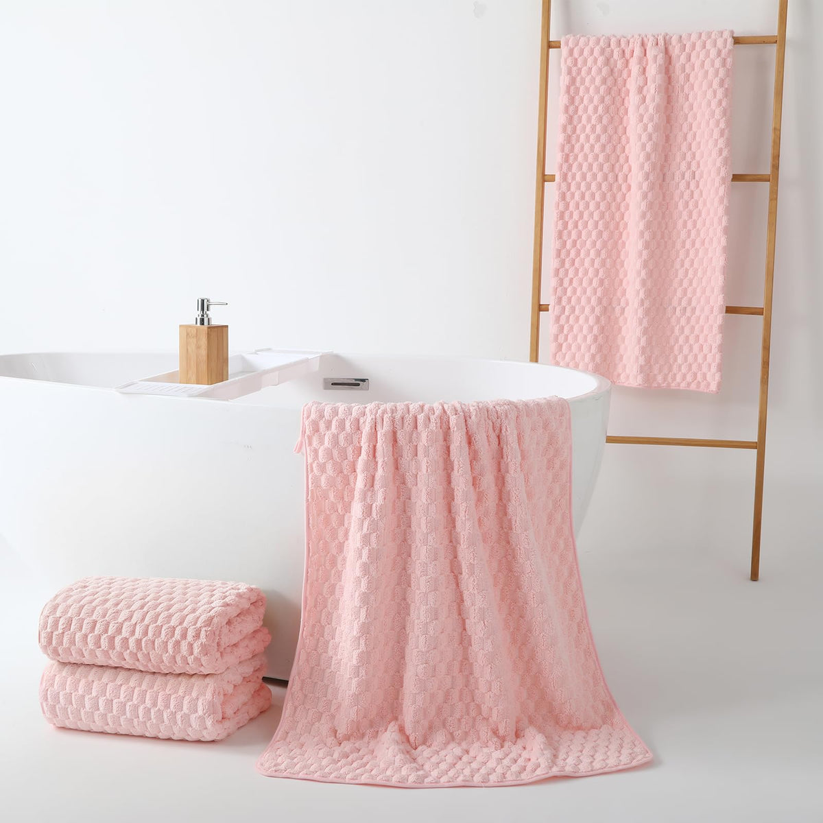 REDKISS pink towel set, ideal for gym, travel, and spa routines.