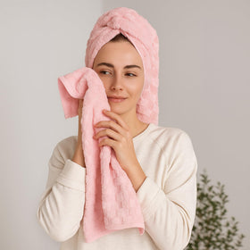 REDKISS pink microfiber towel, lint-free and gentle on skin.