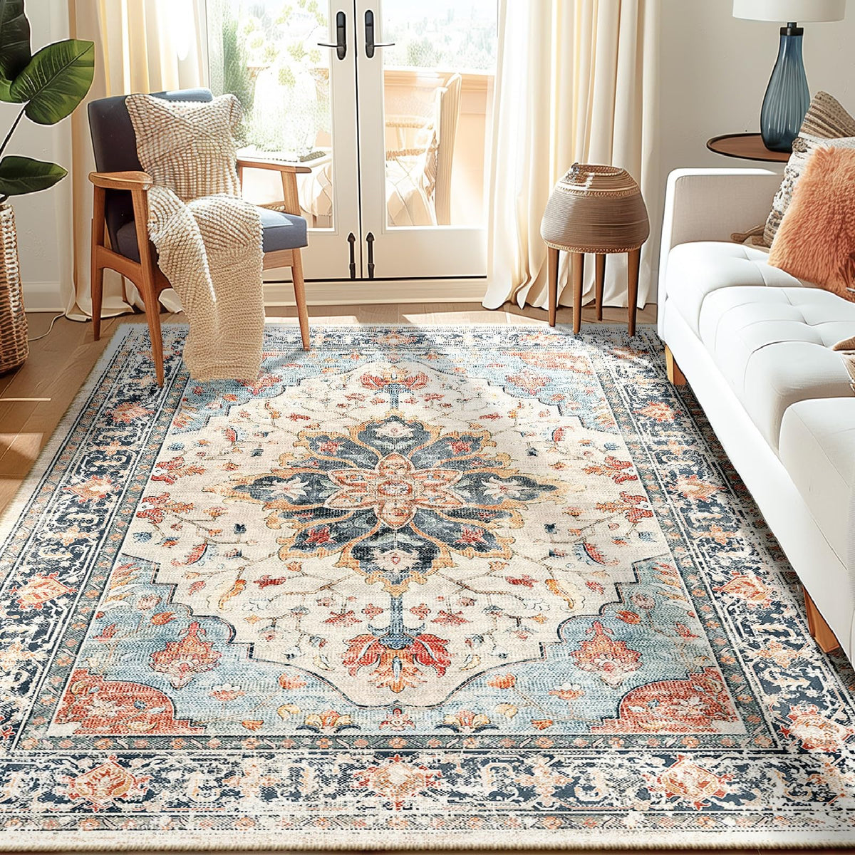 RELEANY area rug with floral medallion in beige and navy adds vintage charm to living room