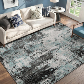 RELEANY 5x7 blue-teal washable rug top view with bold abstract pattern for living spaces.