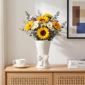 Relexome bow vase suitable for water-filled floral displays with no leaks.