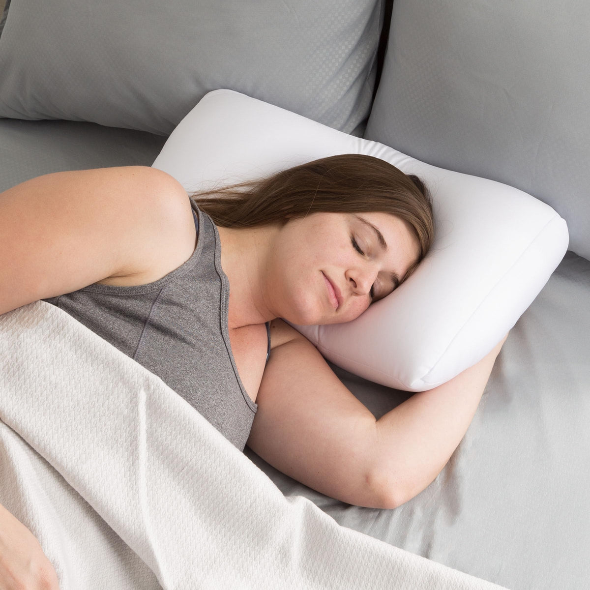 Remedy Microbead Pillow with cooling beads promotes airflow for cooler nights.