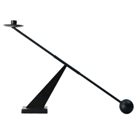 Remenna black metal candle holder with sleek design for modern table decor.