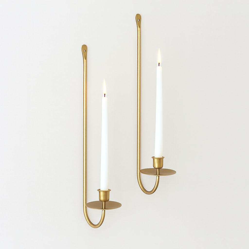 Remenna wall candle holder in wrought iron with gold finish for a durable, elegant touch.