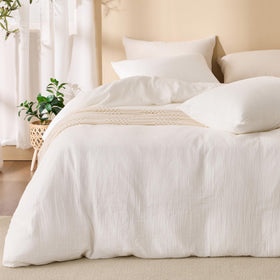 Renewroots off-white queen duvet cover showing a clean, coordinated look.