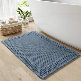 RESARE waffle bath mat texture with tassels enhances boho style and comfort.