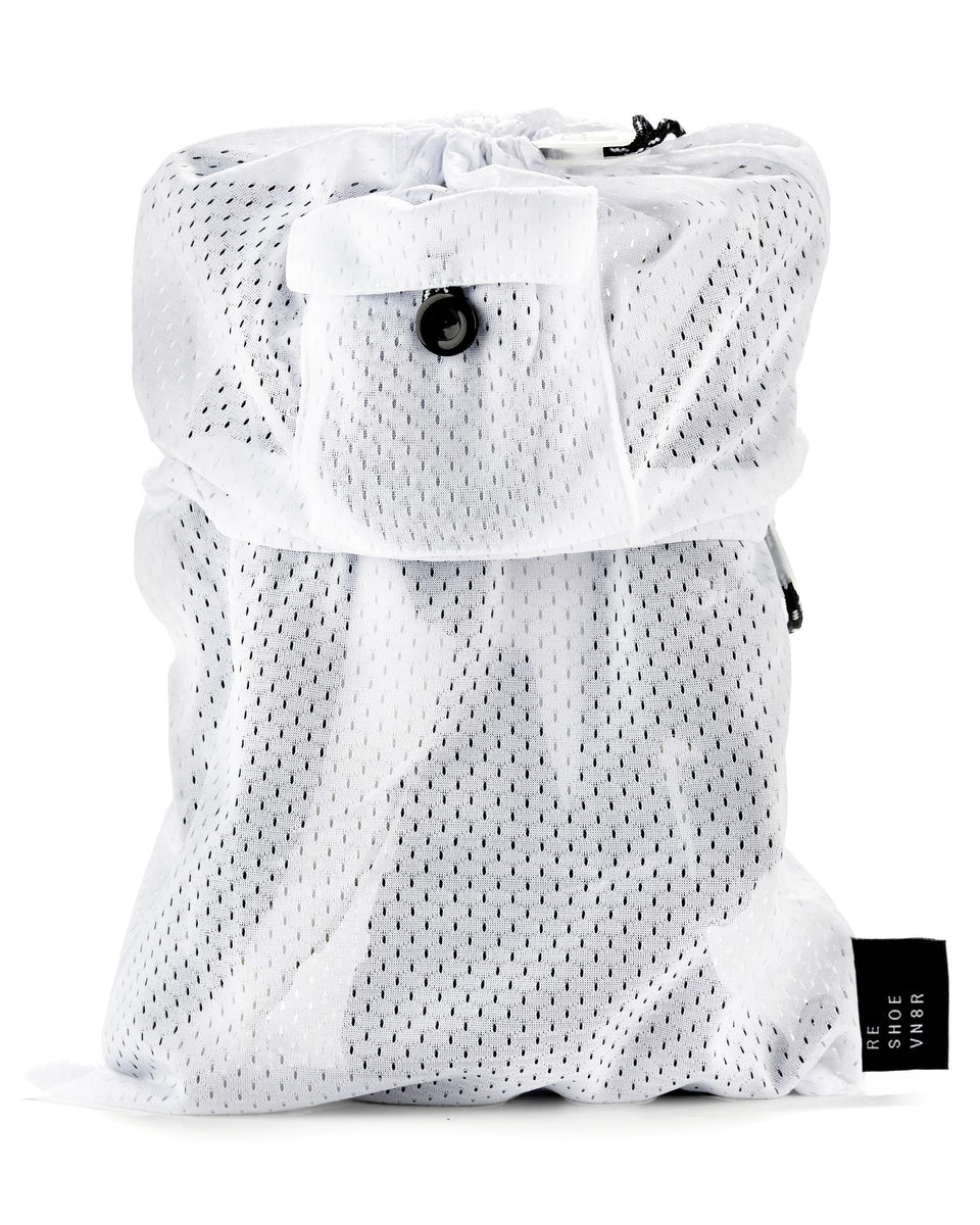 RESHOEVN8R sneaker laundry bag open showing dual lace locking system for secure washing.