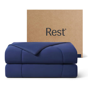 REST Evercool cooling comforter on bed shows breathable fabric for all-season comfort