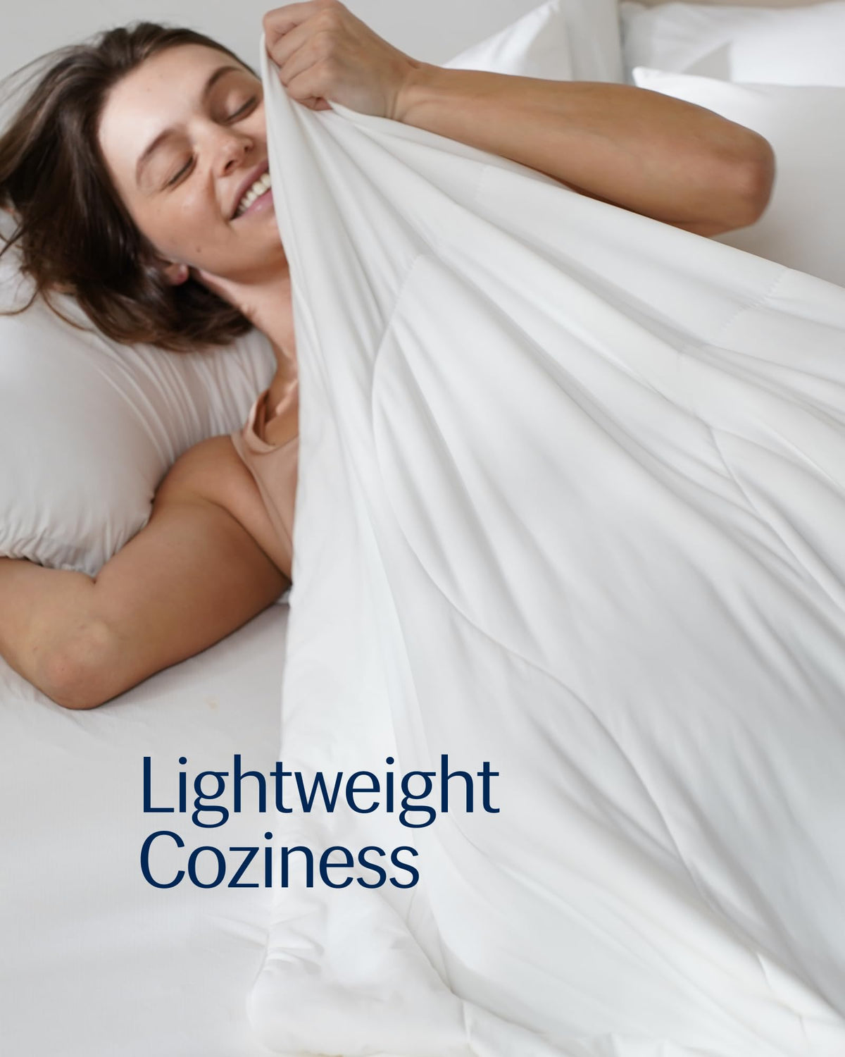 REST Evercool cooling comforter draped over bed demonstrating versatile use