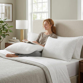 RESTOVIA pillow laid flat for back sleepers shows balanced neck support.