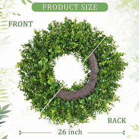 Large 26-inch wreath mounted on front door for inviting entry