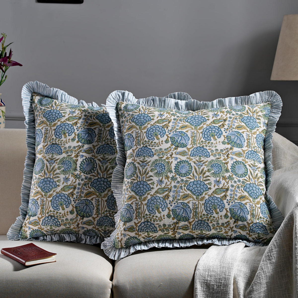 Ridhi asparagus green pillow cover with ruffle side detail adds elegant texture