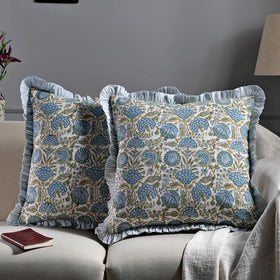 Ridhi elegant ruffle detail pillow cover adds luxe charm to sofa.