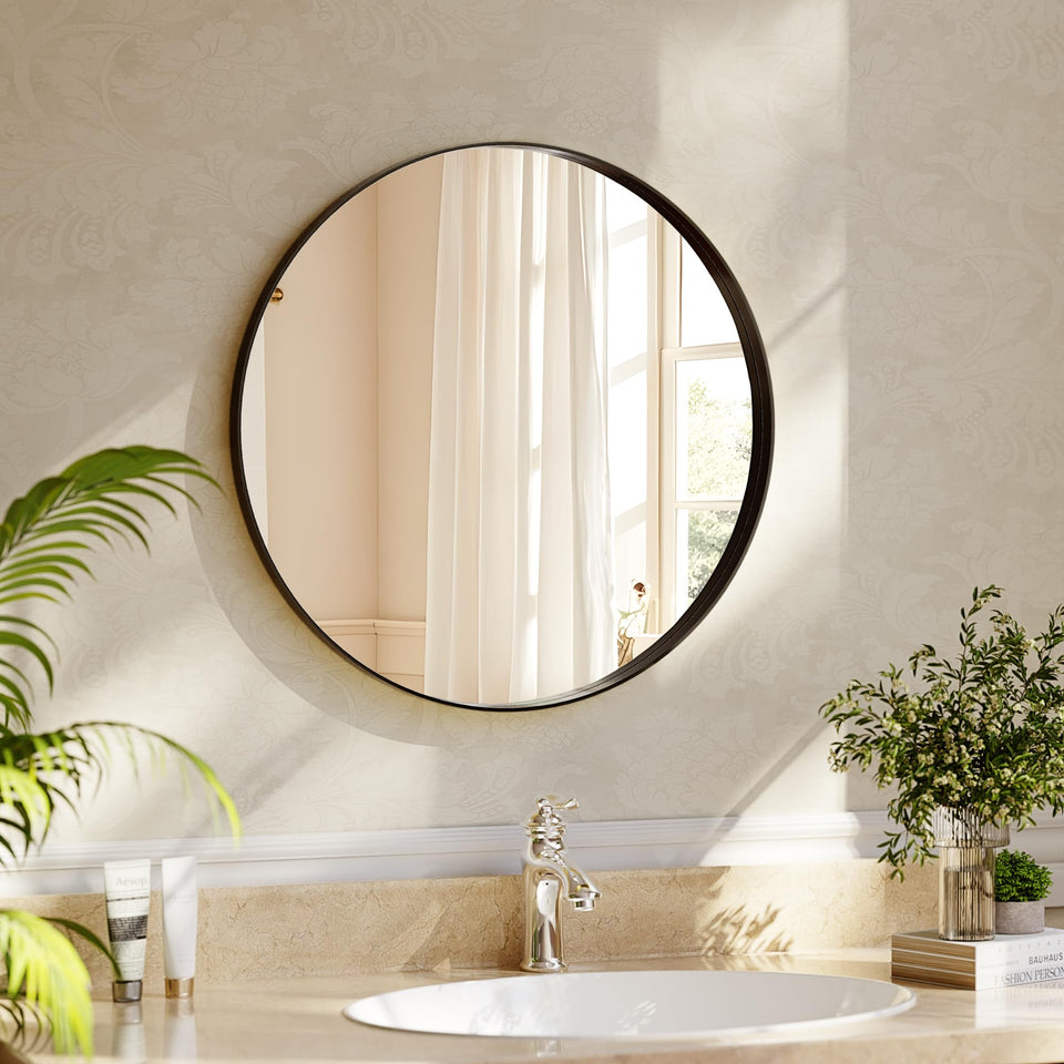 Riskioir 24-inch round mirror with deep black frame for modern bathroom ambiance.