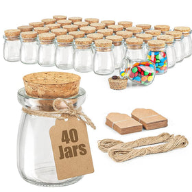 Ritayedet glass favor jars with cork lids on display for elegant wedding favors.