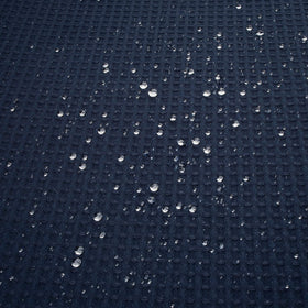 River Dream navy blue bath curtain enhances hotel-inspired bathroom ambiance.
