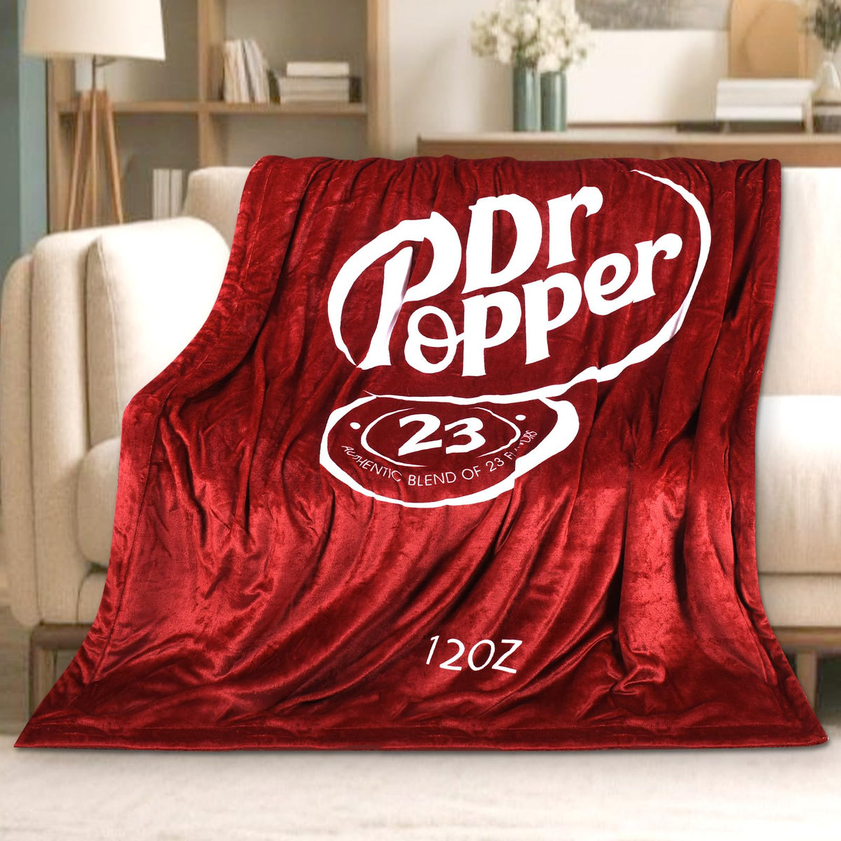 RMKA Dr Pepper blanket logo close-up, perfect for cozy lounging and fans.
