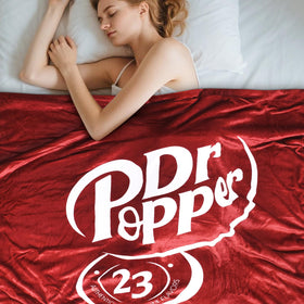 RMKA Dr Pepper blanket care guide image shows machine washing ease.