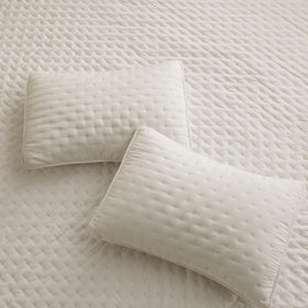 ROARINGWILD cozy bedroom scene with beige bedding for relaxed nights.