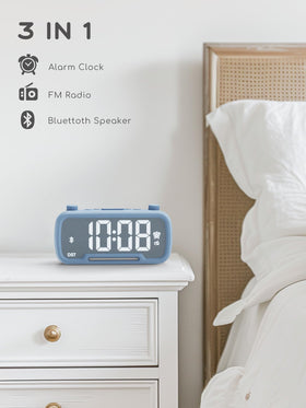ROCAM alarm clock display showing a bright, easy-to-read screen in dim light.