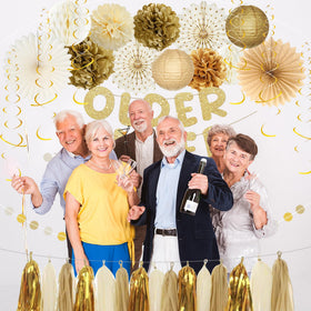Roetyce gold paper fans add shimmering wall texture.