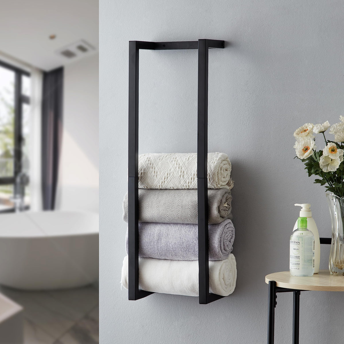 Roeveca towel rack for rolled towels keeps towels neatly organized.