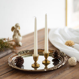 Romadedi brass candlesticks used in wedding decor with candlelight