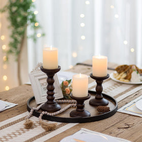Romadedi rustic candlesticks elevate fireplace mantel ambience.