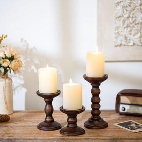 Romadedi candle holder top metal plate detail complements rustic interiors.