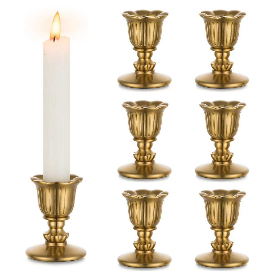 Romadedi vintage brass candlestick holders arranged as a table centerpiece highlighting warm glow