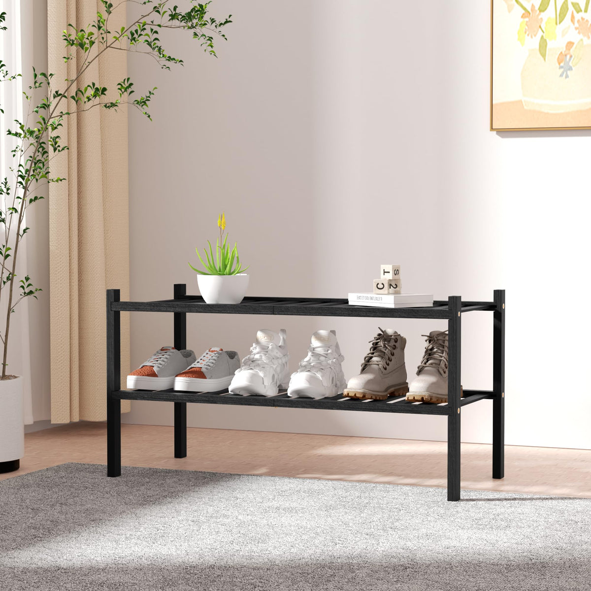 ROMGUAR CRAFT stackable shoe rack being assembled for flexible storage.