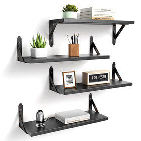 ROMGUAR CRAFT wood floating shelves set of four mounted on wall for versatile storage.