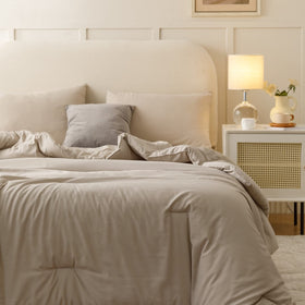 ROSGONIA oatmeal boho-neutral bedding enhances a calm king bed