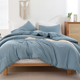 ROSGONIA dusty blue comforter on queen bed for cozy all-season lounging