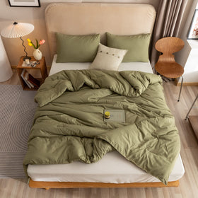 ROSGONIA olive green bed setup on king size bed, chic boho look.